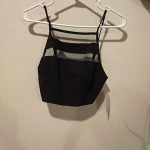 Brand new! Crop top with sheer cut outs.